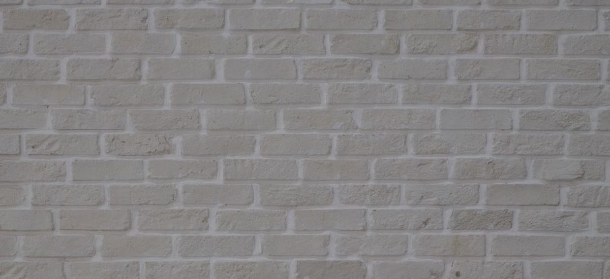 High-resolution image of a white painted brick wall with natural texture.